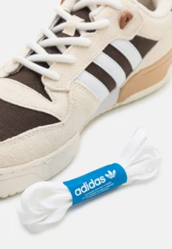 Adidas Originals Rivalry Unisex - Trainers - White/Footwear White/Dark Brown -JELLYCAT SALES 45697989ee17434bba499bb016f5eca6 scaled