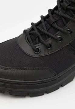 Dr. Martens Combs Tech -8 Eye Boot Unisex - Lace-Up Ankle Boots -JELLYCAT SALES 77b29e2864f14f8295e83cacfd42b954 scaled