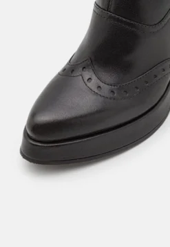 Chie Mihara Fayu - Platform Ankle Boots -JELLYCAT SALES 7d7e049190814094a9298293624de1a7 scaled